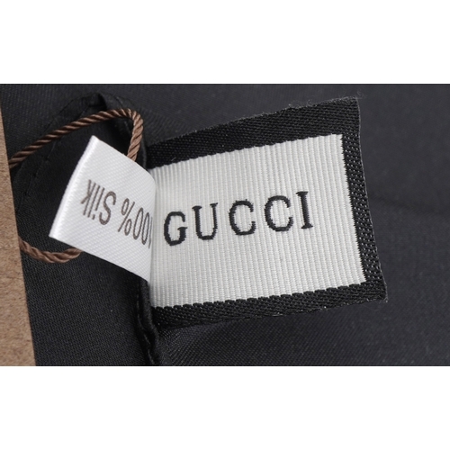 561 - Gucci, an Italian silk scarf in the Flora print designed by Vittorio Accornero, 88cm x 88cm.