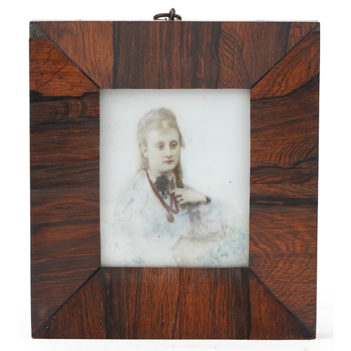 30 - An early 19th century hand painted porcelain plaque with a female bust, signed verso and housed in a... 