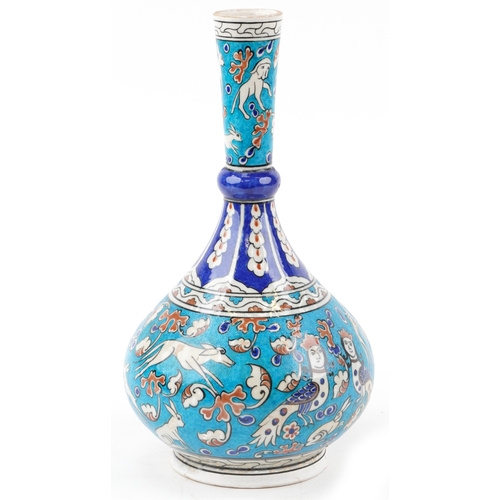 50 - A Turkish Ottoman Iznik vase hand painted with animals and stylized motifs, 41cm high.