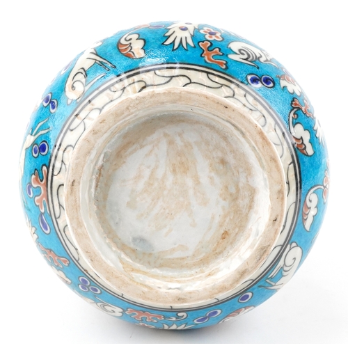 50 - A Turkish Ottoman Iznik vase hand painted with animals and stylized motifs, 41cm high.