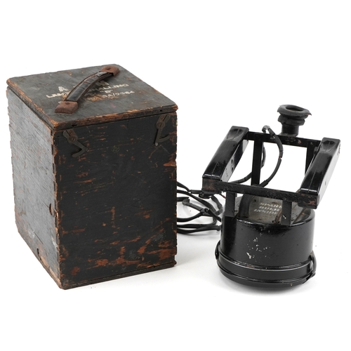 1258 - An early 20th century A M 'type B' signalling lamp, bearing reference number 5A/2334, within a stain... 