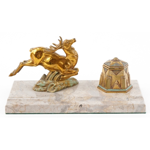 4 - An Art Deco marble desk stand mounted with a brass inkwell and stag, 26cm wide.