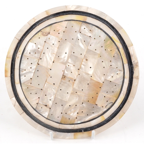 53 - An Indian Goa mother of pearl plate, 21.5cm in diameter.