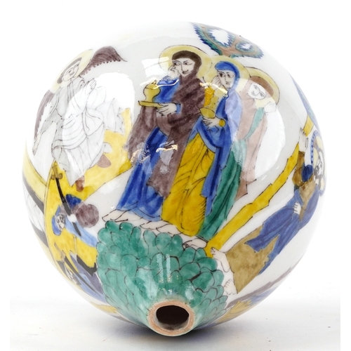 57 - A Turkish Ottoman Kutahya hanging ball hand painted with biblical figures, 20cm high.