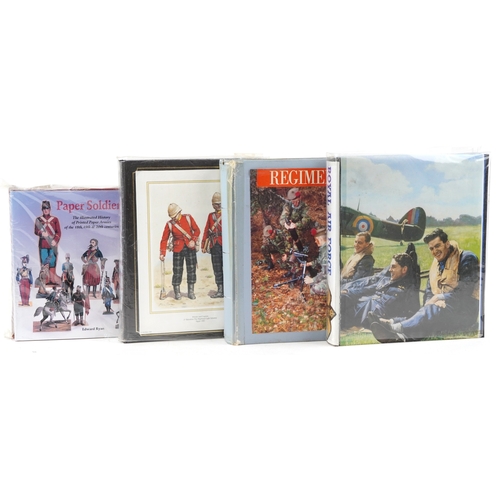 1304 - A large collection of military interest cigarette cards, some silk, arranged in three albums and Pap... 