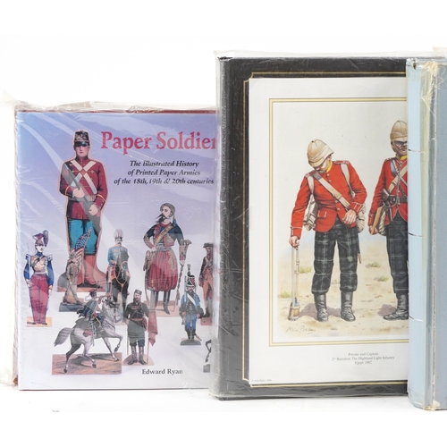 1304 - A large collection of military interest cigarette cards, some silk, arranged in three albums and Pap... 