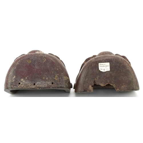 46 - Two Chinese Ching Dynasty Shauxi wooden hand masks, 15cm wide.