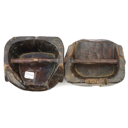 46 - Two Chinese Ching Dynasty Shauxi wooden hand masks, 15cm wide.