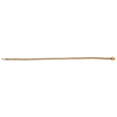 3020 - A 9ct gold diamond two line bracelet, 20cm in length, 8.3g.