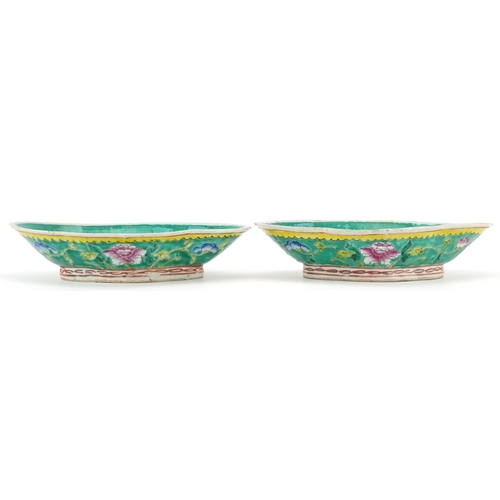 37 - A near pair of Chinese famille rose porcelain dishes, early 20th century, one bearing four character... 