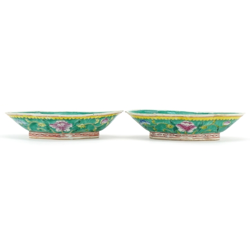 37 - A near pair of Chinese famille rose porcelain dishes, early 20th century, one bearing four character... 