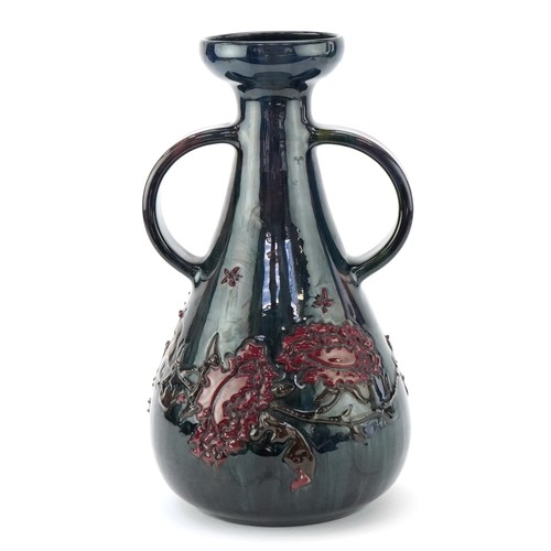 An early 20th century Elton Ware Pottery twin handled, Clevedon Studio bearing signature to the base, 33cm high.
