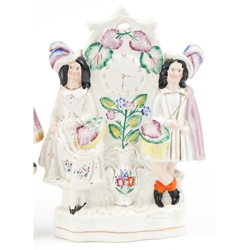 85 - A group of three Victorian Staffordshire Pottery flatbacks, the largest 34cm high.