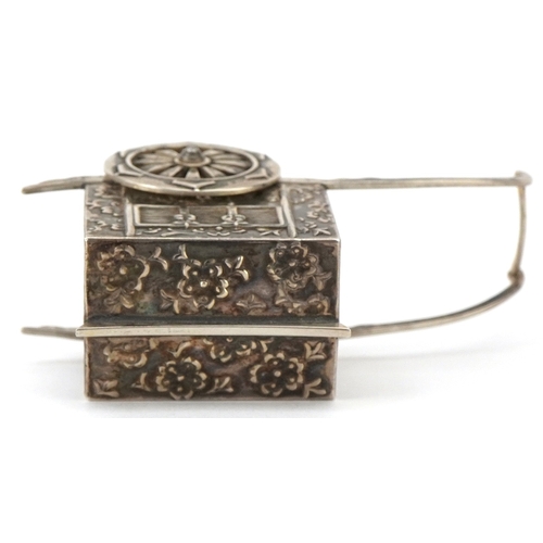 65 - A novelty Japanese sterling silver caster in the form of a rickshaw with rotating wheels, 6.5cm in l... 