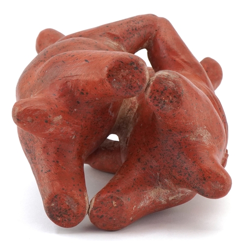 466 - A terracotta figure group of Colima dogs, 20cm high.
