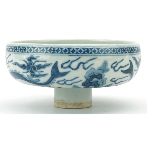 114 - A Chinese blue and white porcelain stem bowl hand painted with dragons, character marks to the inter... 