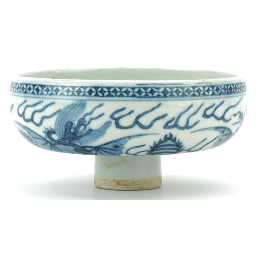 114 - A Chinese blue and white porcelain stem bowl hand painted with dragons, character marks to the inter... 