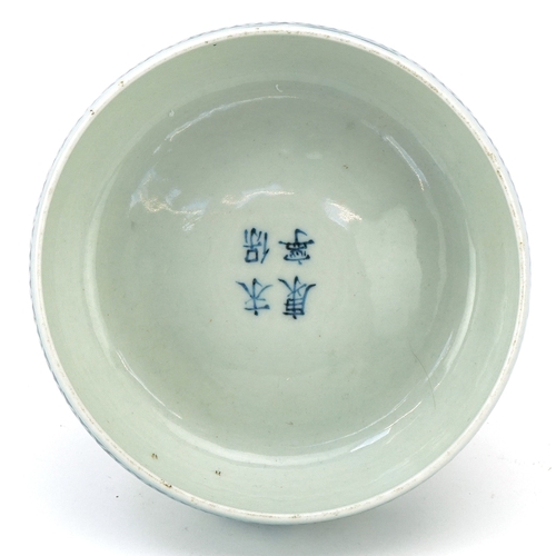 114 - A Chinese blue and white porcelain stem bowl hand painted with dragons, character marks to the inter... 