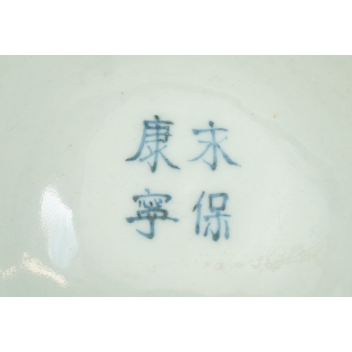 114 - A Chinese blue and white porcelain stem bowl hand painted with dragons, character marks to the inter... 
