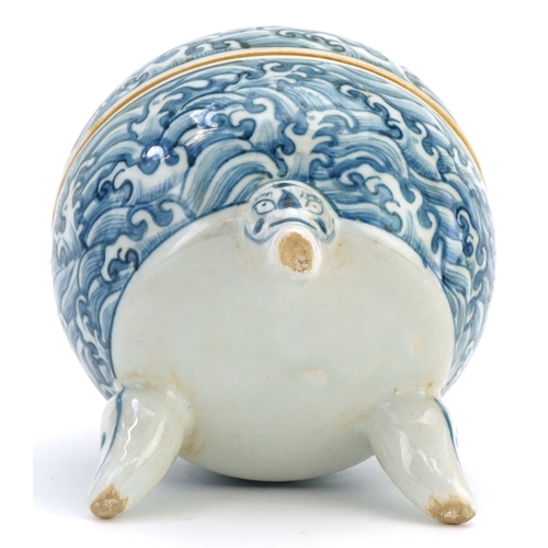 111 - A Chinese blue and white porcelain tripod incense bowl and cover hand painted with masks, crashing w... 