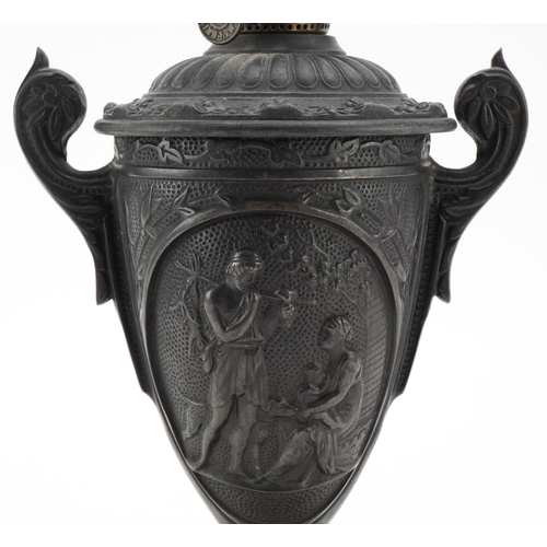76 - A Grand Tour design cast iron oil lamp base cast with classical figures, foundry mark to the base, 2... 