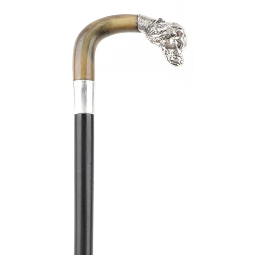 A George V ebonised walking stick with silver mounted horn handle in the form of a dog's head, Birmingham 1919, 92cm in length.