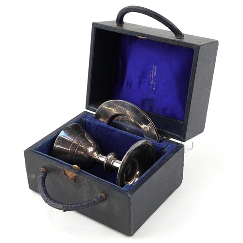 104 - D. G. Collins, an ecclesiastical silver plated communion set with chalice housed in a velvet and sil... 