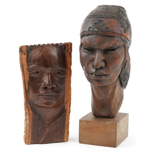 468 - Two softwood sculptures comprising a Native American male head signed by Armaza and an African carve... 