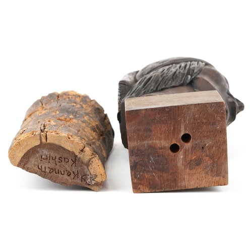 468 - Two softwood sculptures comprising a Native American male head signed by Armaza and an African carve... 