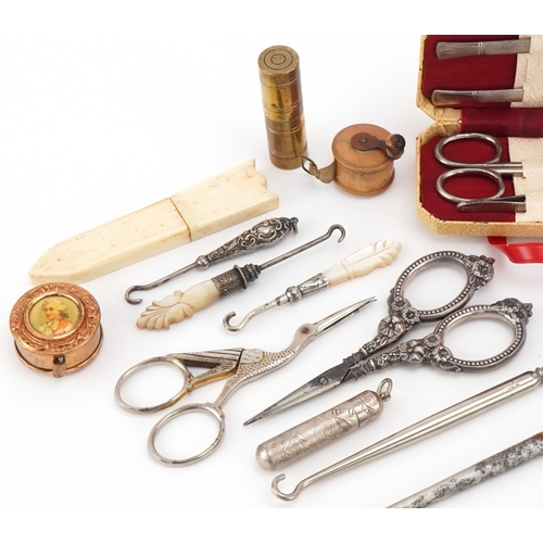 Antique and later sewing objects including silver handled buttonhooks ...