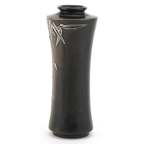 63 - A Japanese silver overlaid bronze vase decorated with bamboo grove, 17.5cm high.