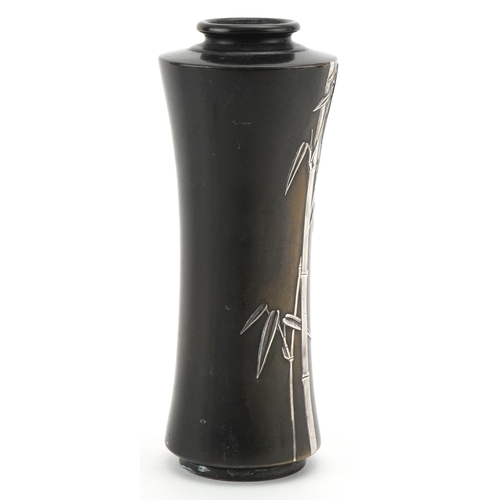 63 - A Japanese silver overlaid bronze vase decorated with bamboo grove, 17.5cm high.