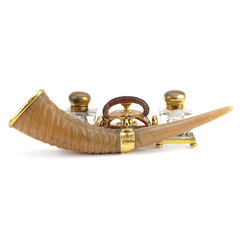 101 - Edwardian gilt brass and horn desk stand with two glass inkwells engraved To the indefatigable and e... 
