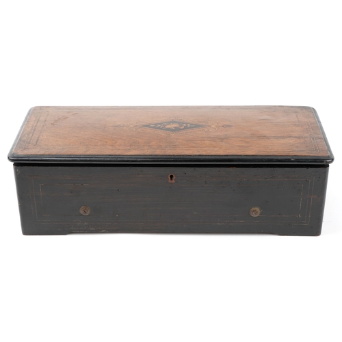 109 - Nicole Frères, a 19th century Swiss inlaid burr walnut music box playing on six airs, 50cm wide.