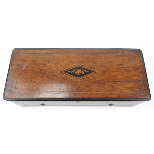 109 - Nicole Frères, a 19th century Swiss inlaid burr walnut music box playing on six airs, 50cm wide.
