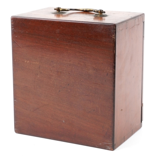 518 - A 19th century brass microscope with fitted case by W J Salmon, London, the case 21cm high.