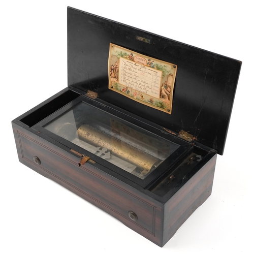 110 - An early 19th century inlaid burr walnut music box playing on six airs, paper label to the interior,... 