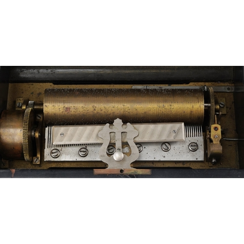 110 - An early 19th century inlaid burr walnut music box playing on six airs, paper label to the interior,... 