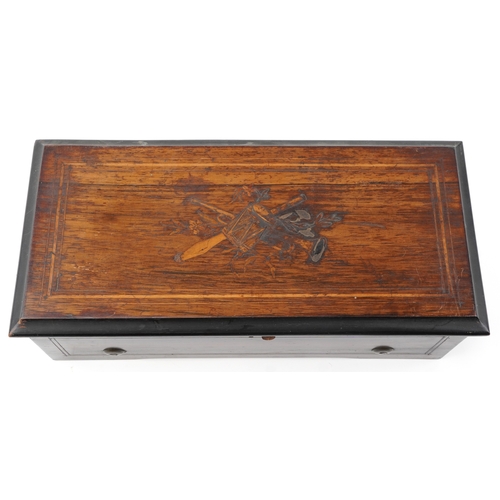 110 - An early 19th century inlaid burr walnut music box playing on six airs, paper label to the interior,... 