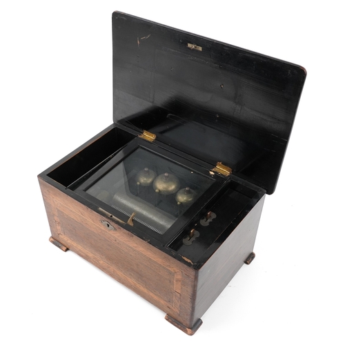 107 - An early 19th century inlaid burr walnut music box with three bells, 22cm H x 41.5cm W x 26cm deep.