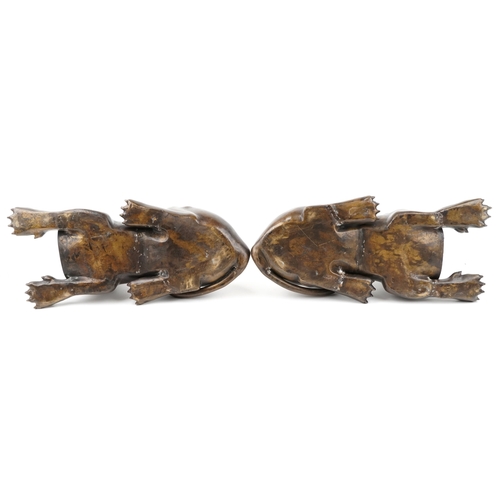 129 - A large pair of decorative bronze models of Egyptian sphynx, 33cm H x 59cm L x 38cm D.