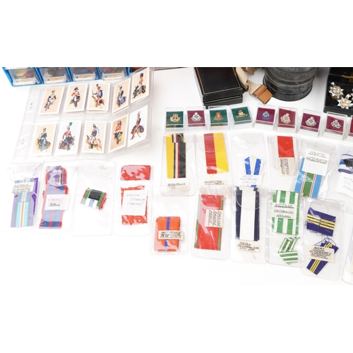 An extensive collection of military interest medal ribbons, bars and ...
