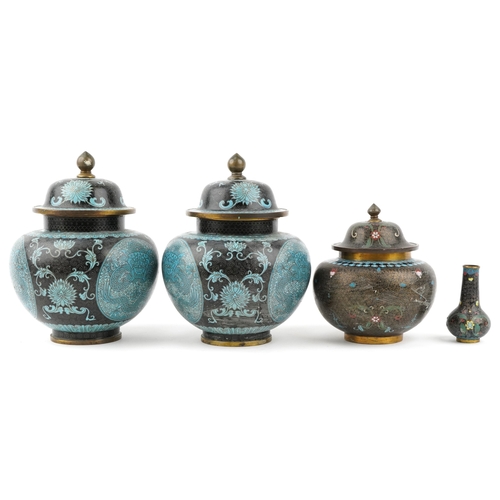 61 - A pair of Chinese cloisonné vases and covers, 20th century, 26cm high, together with a similar small... 