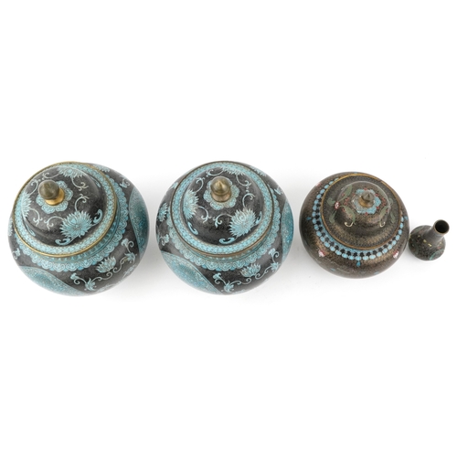 61 - A pair of Chinese cloisonné vases and covers, 20th century, 26cm high, together with a similar small... 