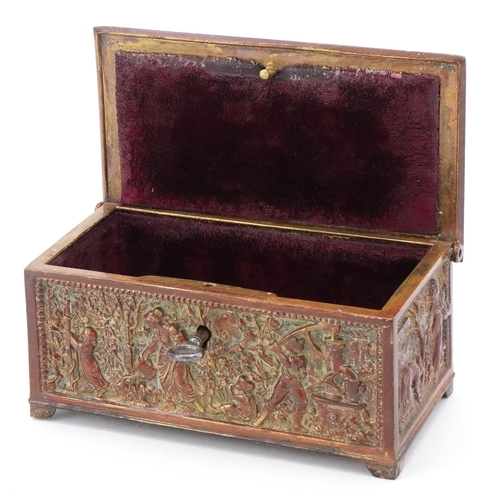 73 - An antique Grand Tour style brass jewellery casket profusely embossed with classical figures and a f... 