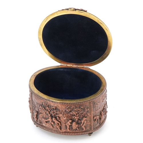 71 - An antique Grand Tour style copper jewellery casket embossed in high relief with rural scenes, 8cm h... 