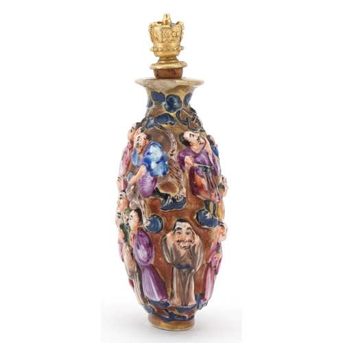 118 - A Chinese Canton porcelain scent bottle moulded in high relief with figures and hand painted in the ... 