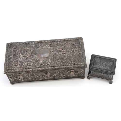 70 - Two antique silver plated jewellery caskets including a pewter example embossed with panels of sheph... 