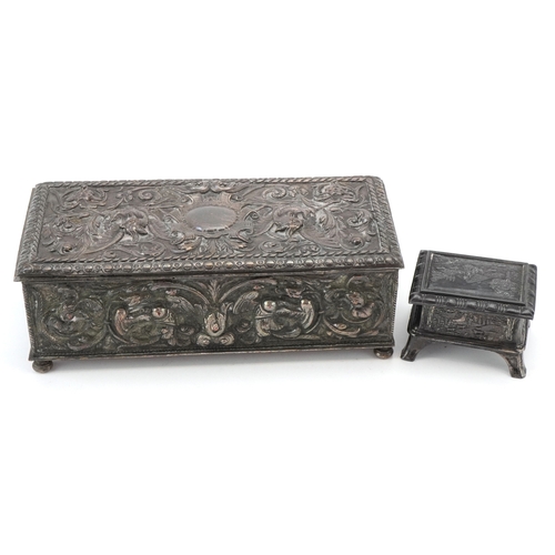 70 - Two antique silver plated jewellery caskets including a pewter example embossed with panels of sheph... 