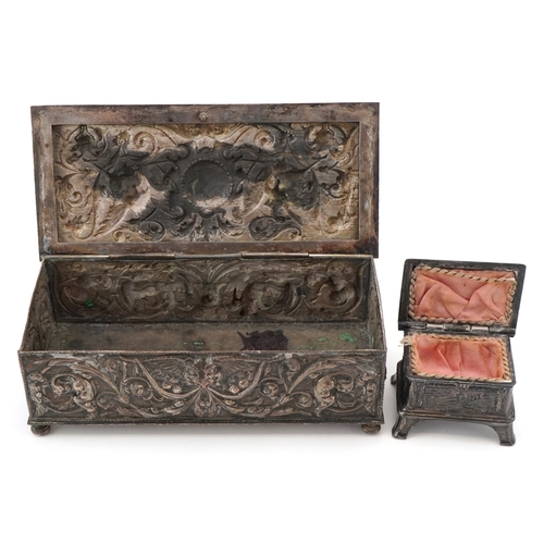 70 - Two antique silver plated jewellery caskets including a pewter example embossed with panels of sheph... 
